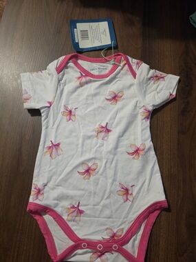 Coco Moon Plumeria Print Onesie